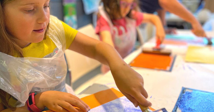 children enjoying arts and crafts at the Bowes Museum